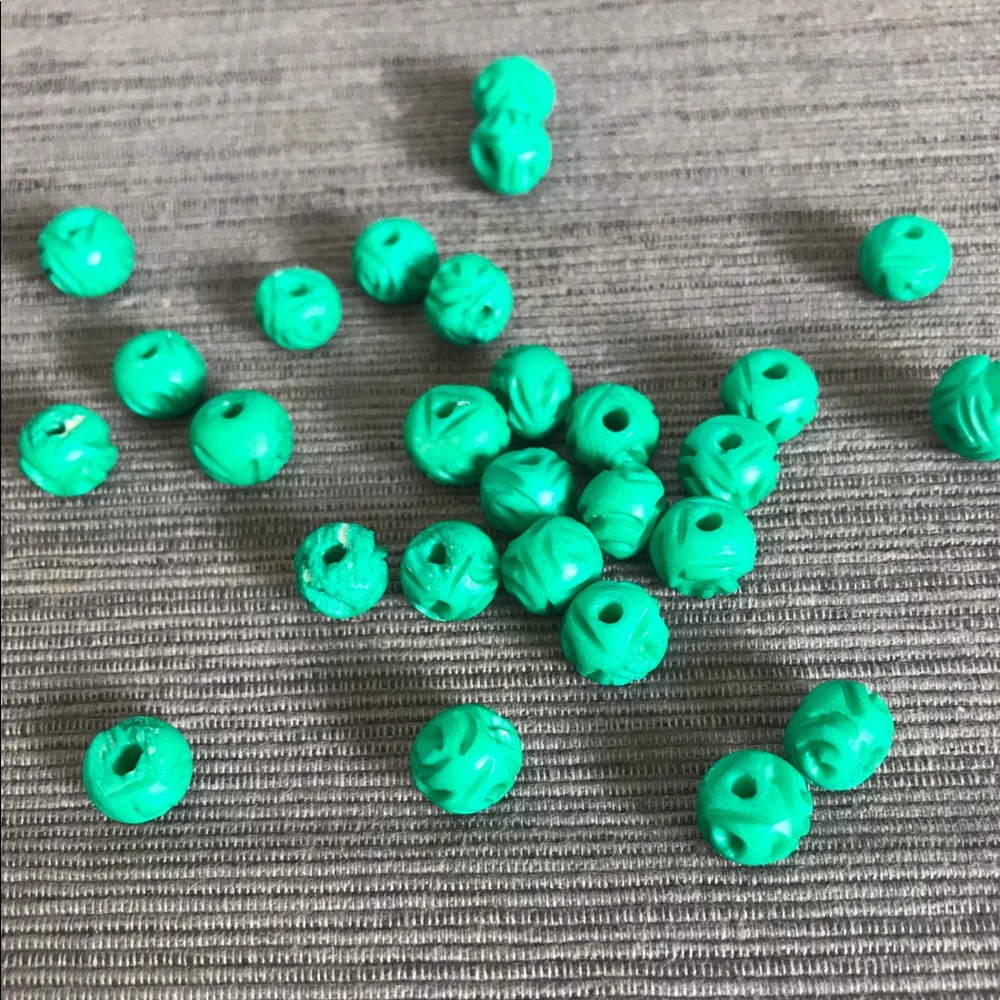 PERUVIAN GREEN ACRYLIC ROUND BEADS CARVED DESIGN